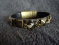 Pulsera Modelo (094): leopardo con cadena.